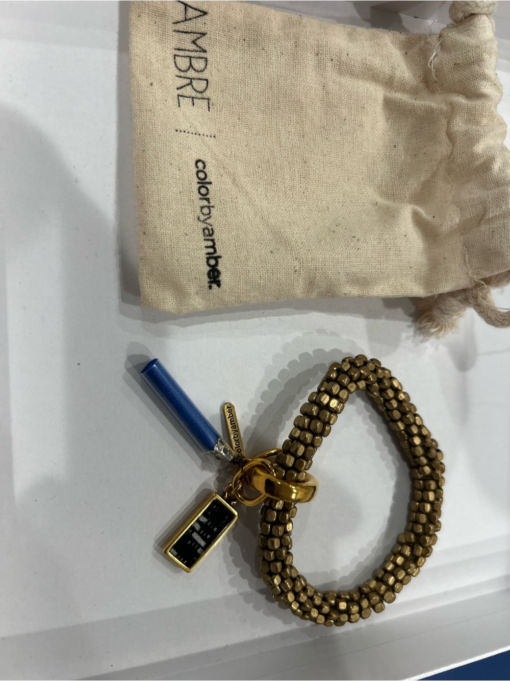 Gold-Tone Beaded Charm Bracelet with Blue Accent